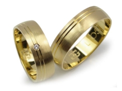 Obrączki ślubne z żółtego złota 333 półokrągłe z cyrkonią 6mm Lovely L057-333
