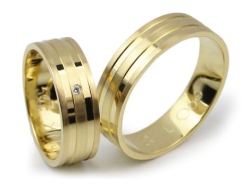 Obrączki ślubne z żółtego złota 333 płaskie z cyrkonią 6mm Lovely L066-333