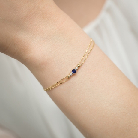 Przejdź do produktu Bransoletka z żółtego złota 585 z szafirem 0,15ct i diamentami The Diamonds B005