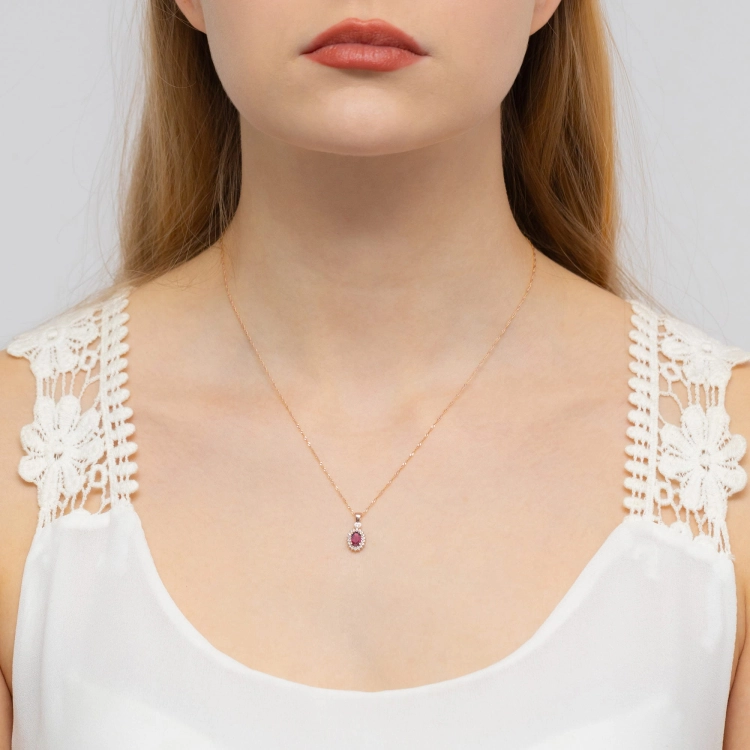 Zawieszka z różowego złota 585 z rubinem i diamentami 0,095ct The Diamonds