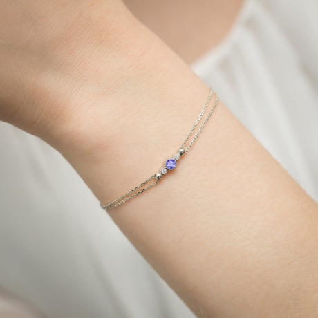 Przejdź do produktu Bransoletka z białego złota 585 z tanzanitem 0,15ct i diamentami The Diamonds B005 