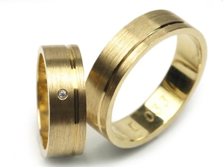 Obrączki ślubne z żółtego złota płaskie z cyrkonią 6mm Estetic E033
