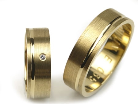 Obrączki ślubne z żółtego złota płaskie z cyrkonią 6mm Estetic E035
